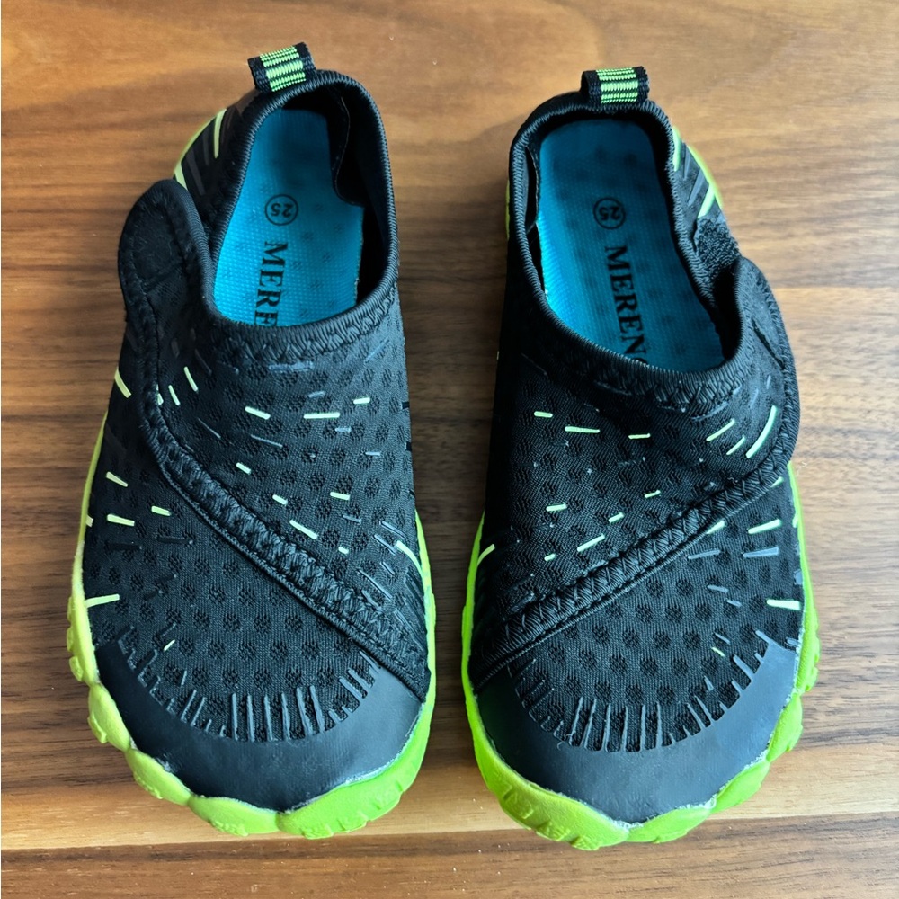 Black and green water shoes